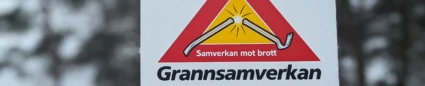 Skylt där det står Grannsamverkan mot brott