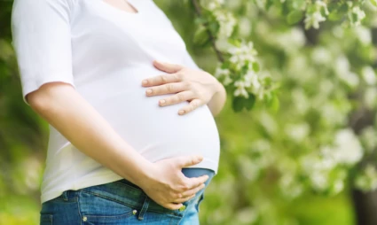 En kvinna som är gravid